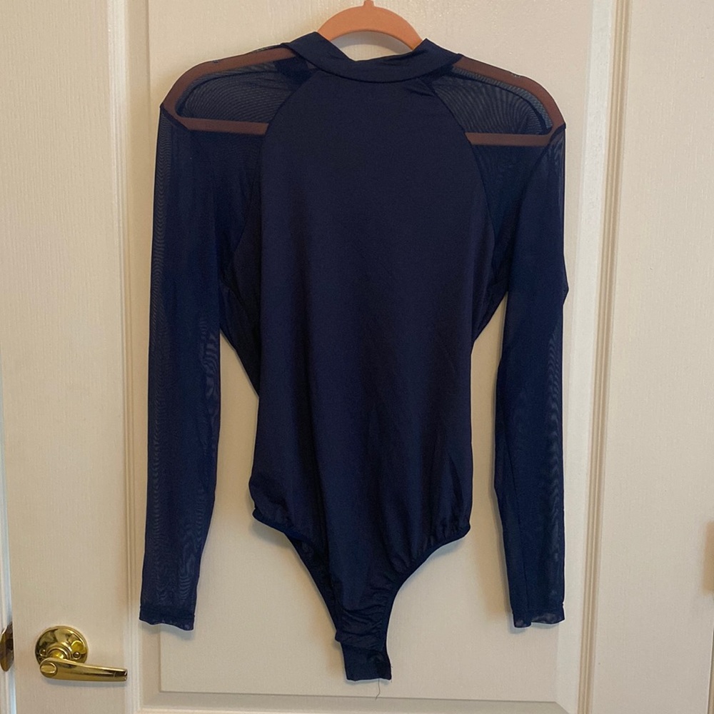 Women’s bodysuit size medium. Super cute! Mesh back and sleeves!